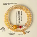 Dubbelstrengs gouden rutielkwarts armband met tijgeroog kraal en kalebas hanger - 6mm Natuurlijk Gouden Rutilkwarts (925 Zilver)