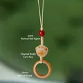 Bijou de téléphone fait main en bodhi avec patte de chat, agate rouge et anneau jaune - Pendentif Patte de Chat Bodhi Agate au Charbon