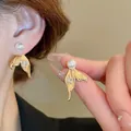 Eleganti orecchini a coda di sirena dorati con perla e zircone a cuore, stile coreano - A009鱼尾巴