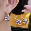 Vintage Korean style earrings featuring purple crystal spheres and gold leverbacks. - Faceted Ball Style (E2555) / Purple