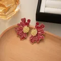 Eleganti orecchini a margherita rossi stile rétro francese con centro dorato - Rosso