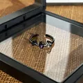 Close-up of gothic dark bat open ring with purple heart gemstone in a black gift box - Style 4 Adjustable Ring