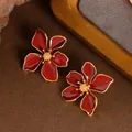 Eleganti orecchini a lobo a fiore in smalto rosso scuro con bordo oro - Rosso