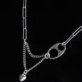 Detail van de vintage Thai zilveren ketting met hartjeshanger en varkenssnuit - Thaise Zilveren Hart Ovale Schakel Stijl (EH0955)