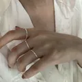 Set of three minimalist S925 sterling silver sparkling thin rings for women shown on hand - Starry Sparkle Thin Ring (J927) / Size 8 / Silver