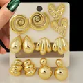 Detail shot of a 6-pair gold earring set with spiral and heart shapes on a card. - Creative Multi-Pair Collection (TZ023) / 6 Pairs Set