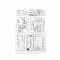 Detailed view of vintage transparent silicone stamps featuring antique document designs. - Table Text
