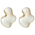 Close-up detail of vintage French geometric cloud earrings with white marbled enamel - Geometric Cloud Style / White