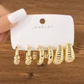 Detailed view of three pairs of chunky gold-toned hoop and drop earrings set - Striped Knotted Water Drop Set (TZ008) / 3 Pairs Set