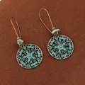 Orecchini pendenti bohémien vintage con patina turchese e design mandala - C Tondo Verde Scuro