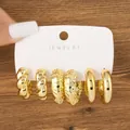 Set of 3 chunky gold hoop earrings featuring twist, textured, and smooth C-shapes. - Twisted Hammered C-Shape Set (TZ012) / 3 Pairs Set