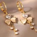 Elegant gold plated clover tassel earrings with cat's eye stone and rhinestones for women - Clover Tassel Style (E3033) / Gold