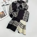 Fair Isle jacquard knitted scarf for winter featuring black and white geometric patterns - Double-sided snowflake knit black