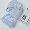 Light blue Fair Isle knitted scarf with double-sided jacquard snowflake pattern for winter - Double sided snowflake knit blue