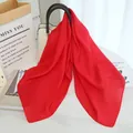 Vibrant red lightweight scarf for women draped on a stylish handbag handle - Red