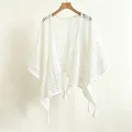Elegant white hollow crochet knit shawl with tassel details for a stylish ethnic look - Tops / White