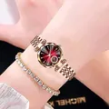 Luxury rose gold women's watch with red sunray dial and diamond tennis bracelet on wrist - 女士腕表加单排网球手链套装 / 玫瑰金红色切面盘