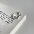 Detailed macro shot of a minimalist S925 silver adjustable ring with heart-shaped zircon - Silver Heart (J2943)