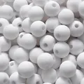 Close-up detail of 8mm matte white acrylic spacer beads for DIY jewelry making projects. - 1800 Pieces/Pack (500g) / White