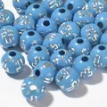 Close-up detail of 8mm blue acrylic round beads featuring silver cross engraving patterns - 1800 Pieces/Pack / Silver Line Medium Blue