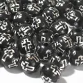 Close-up detail of 8mm black acrylic round loose beads with silver cross pattern - 1800 Pieces/Pack / Black with Silver Thread