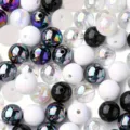 Macro detail of 8mm mixed acrylic beads in black, white, and iridescent holographic finishes - 8mm/1800 Pcs/500g / Black and White