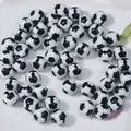 Close-up of black and white soccer ball patterned acrylic beads for DIY jewelry - 8mm / Football White With Black Panels