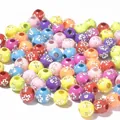 Macro detail of colorful acrylic beads with silver cross patterns for DIY jewelry making - 1800 Pieces/Pack / Silver Line Mixed