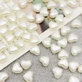 Macro detail of 8mm white heart-shaped ABS imitation pearl beads for DIY jewelry making. - 2500颗装(8mm) / White
