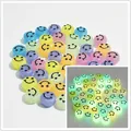 Macro view of 10mm luminous acrylic smiley face beads for DIY jewelry accessories - Smiley Face (6x10 mm Round Smiley Face) / 1600 Count / Luminous Background Black Line