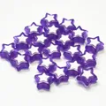 Close-up of purple acrylic star beads with white inner stars for DIY jewelry beading projects - Star Shape / 500g Pack / Purple