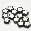 Close-up of black and white flower acrylic beads for DIY crafting jewelry - Plum Blossom / 500g Pack / Black