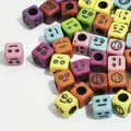Macro view of colorful 6mm acrylic cube beads with various smiley face expressions - 3000 Pieces/Pack / Colorful with Black Letters