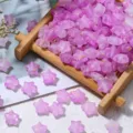 Macro detail of purple matte star beads with gold foil for DIY jewelry making. - 200 Pieces/Pack / Purple