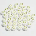 Detail view of 10mm white round acrylic beads with gold smiley face for DIY jewelry crafts - Smiley Face (6x10 mm Round Smiley Face) / 1600 Count / White Base Gold Thread