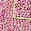 Close-up of 8mm pink marbled acrylic beads with a faux ceramic crackle finish for jewelry making. - 8mm (Approx 1800 Pieces/500g) / Pink