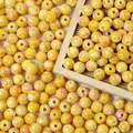 Close-up of 8mm yellow crackle acrylic beads with faux ceramic speckled finish for jewelry - 8mm (Approx 1800 Pieces/500g) / Light Yellow