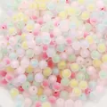 Detail view highlighting the smooth frosted finish and colorful cores of these DIY beads - Matte Mixed Colors
