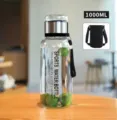 Große 1000ML Glas-Sportwasserflasche inklusive einer praktischen schwarzen Schutzhülle - Natrium-Kalzium-Glas 1000ml mit Hülle / Transparent