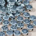 Macro view of 7mm silver acrylic beads with star and moon patterns for DIY crafting - Silver Base with Black Text