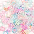 Macro detail of 10-11mm pastel gradient pearl beads in star moon and flower shapes - 2000 Pieces/Pack (500g) / Multicolor