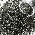 Macro detail of 2mm silver metallic glass seed beads for jewelry making and DIY crafts - 2mm/1200 Pcs/Tube / Gray