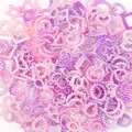 Macro shot of 10-11mm gradient star and moon shaped pearl beads for DIY phone cases - 2000 Pieces/Pack (500g) / Purple