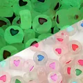 Macro detail of 7mm acrylic heart beads showing glow-in-the-dark and daytime contrast - 4mm x 7mm, 4000 Pieces / Luminous Colorful Letters