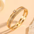 Close-up detail of luxury gold plated stainless steel bangle with paved crystals. - Square Main Diamond Double Layer Style (S209) / Gold