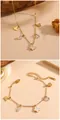 Parure bracelet et collier en acier inoxydable doré avec breloques papillon en nacre - Set Papillon Coquille Blanche Doré (C721-C621)