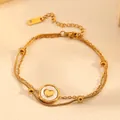 Detailed view of gold double-layer heart pendant anklet made of titanium steel - Heart Bracelet (I114) / Gold