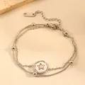 Close-up of double-layer titanium steel anklet featuring a silver star pendant detail. - Star Bracelet (I113) / Steel