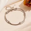 Double-layer stainless steel anklet featuring a sleek snake chain and polished beads - Steel Color Double Layer Blade Bead Bracelet