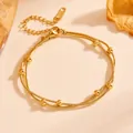 Elegant double-layered gold stainless steel snake chain anklet with delicate beads - Gold Double Layer Snake Chain Bead Bracelet